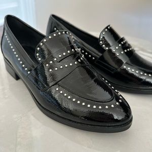 Patient leather loafers with studs from Aldo. Size 7.5 and never been worn.